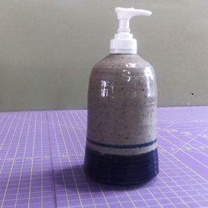 Artist signed pottery soap dispenser
